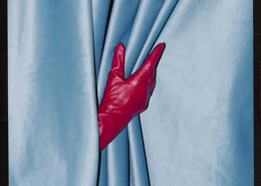 A curtain with a glove